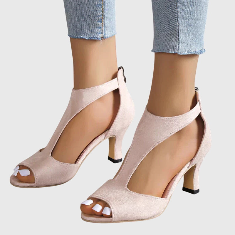 Pink Elizabeth spring heel with cutout design and open toe; women's footwear.