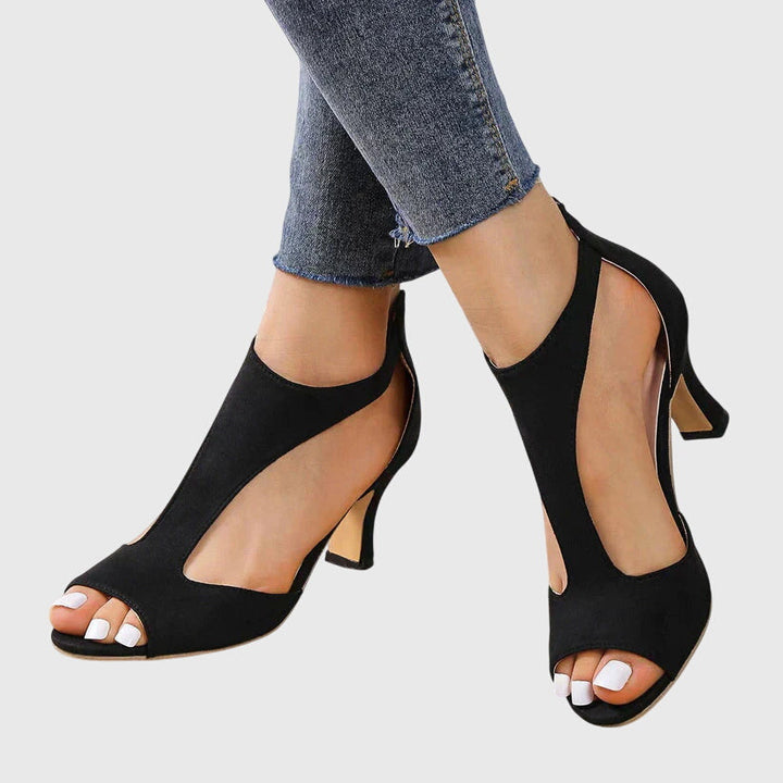 Pink Elizabeth open-toe cutout heel, stylish spring/summer shoe for women.