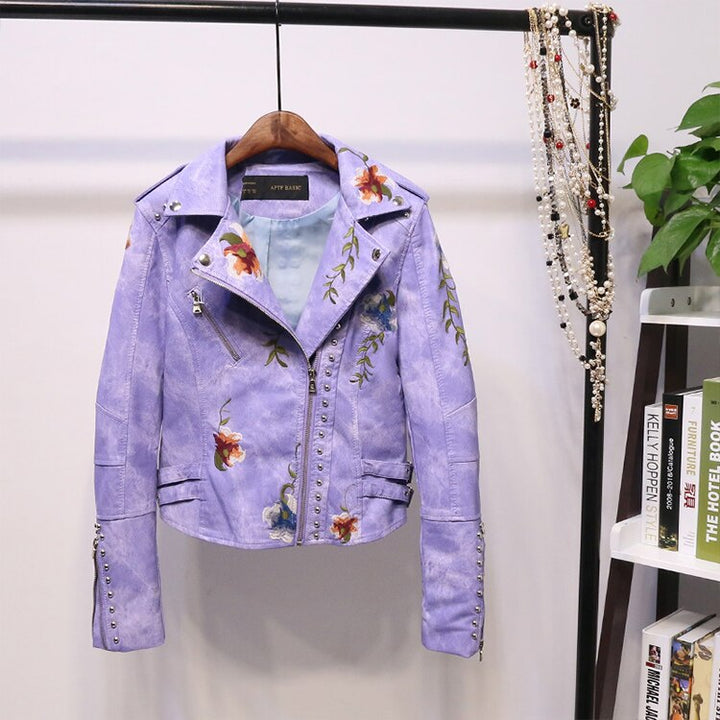 Full view of a women's "Eleonora" embroidered biker jacket, a trendy outerwear piece.
