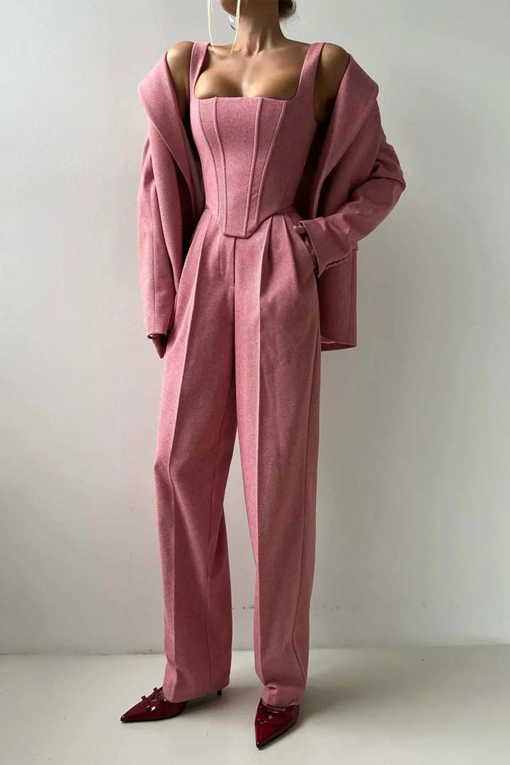 Women's elegant three-piece set with a corset, wide-leg trousers, and a fashion-forward oversized blazer.