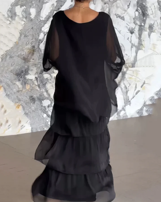 Chic women's flowing long sleeve tiered maxi dress, perfect for modern casual elegance and women's fashion.
