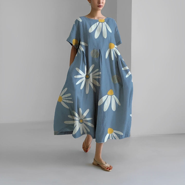 Flowy Boho summer dress with romantic floral print, offering a chic and timeless look, perfect for warm-weather occasions.