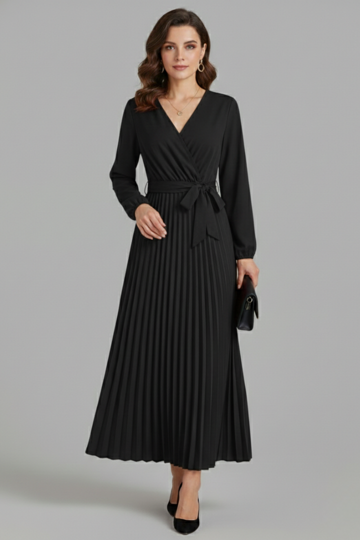 Women's flowing V-neck maxi dress, showcasing a lovely pleated skirt and a stylish tie waist. Perfect fashion.