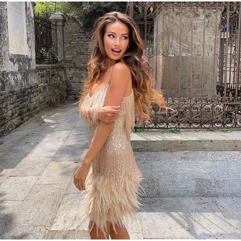 Stunning women's feather mini dress, a glamorous & playful sleeveless party dress for any special evening occasion.