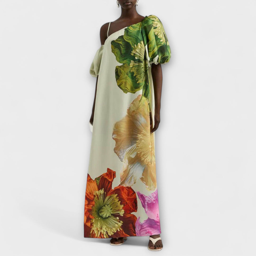 Women's elegant green floral maxi dress featuring an asymmetrical neckline & puff sleeves.