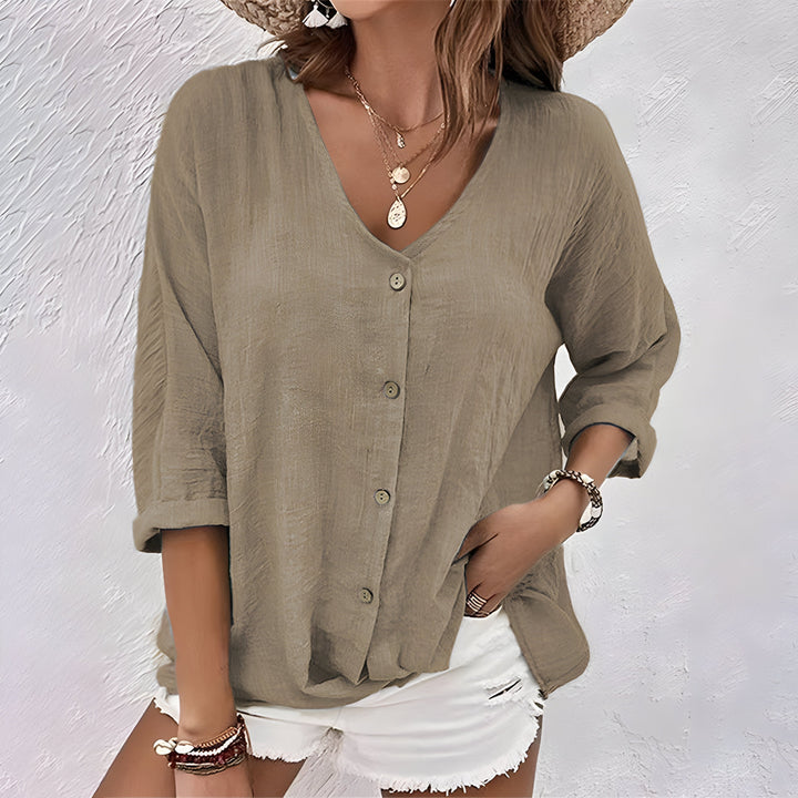 Pink chic relaxed V-neck blouse. Women's button-up elbow sleeve top, perfect for versatile daily wear.