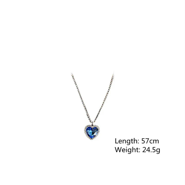 Stylish women's sterling silver heart necklace accessory, sparkling with blue zirconia.