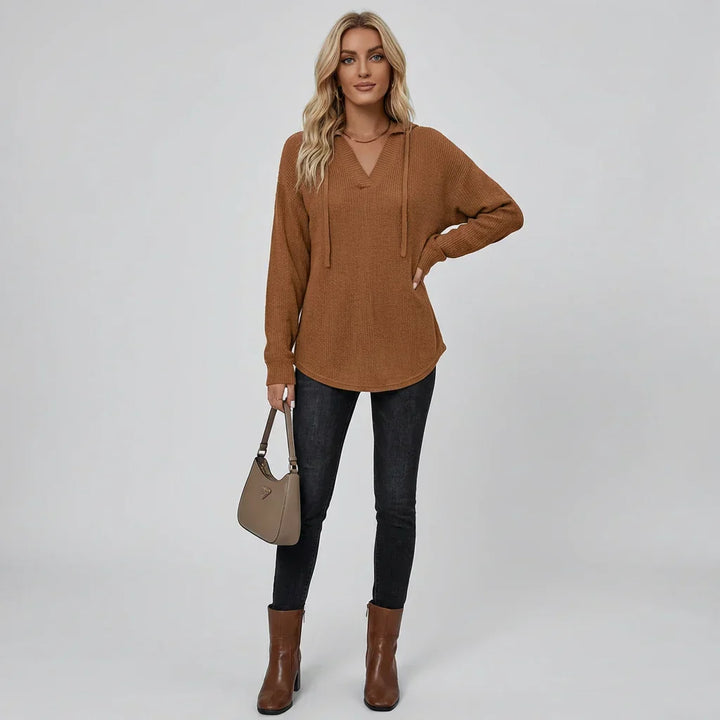 Women's V-neck oversized hoodie in a relaxed fit for effortless casual style and comfortable everyday wear.