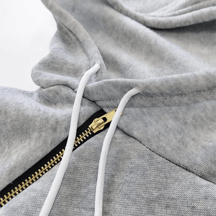 Long sleeve women's sweatshirt dress with hood & practical pockets, ideal for winter.