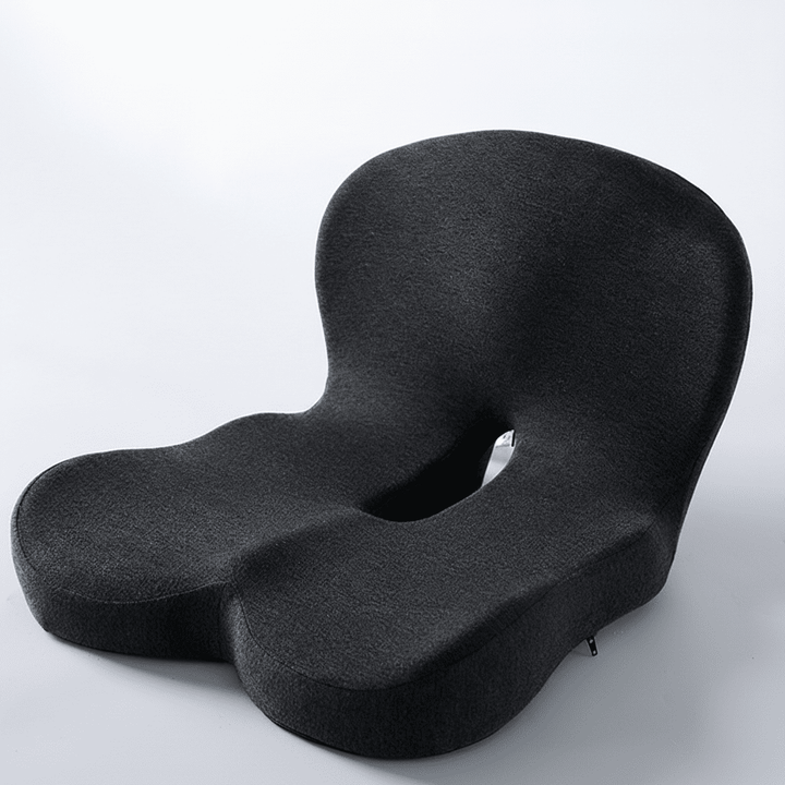 Desk chair memory foam cushion improves posture, relieves back pain. Washable cover included.