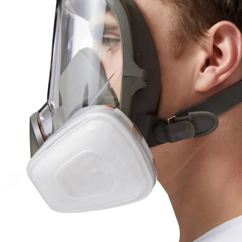 High-quality full face respirator mask, featuring an anti-fog lens and secure silicone seal for reliable PPE safety.