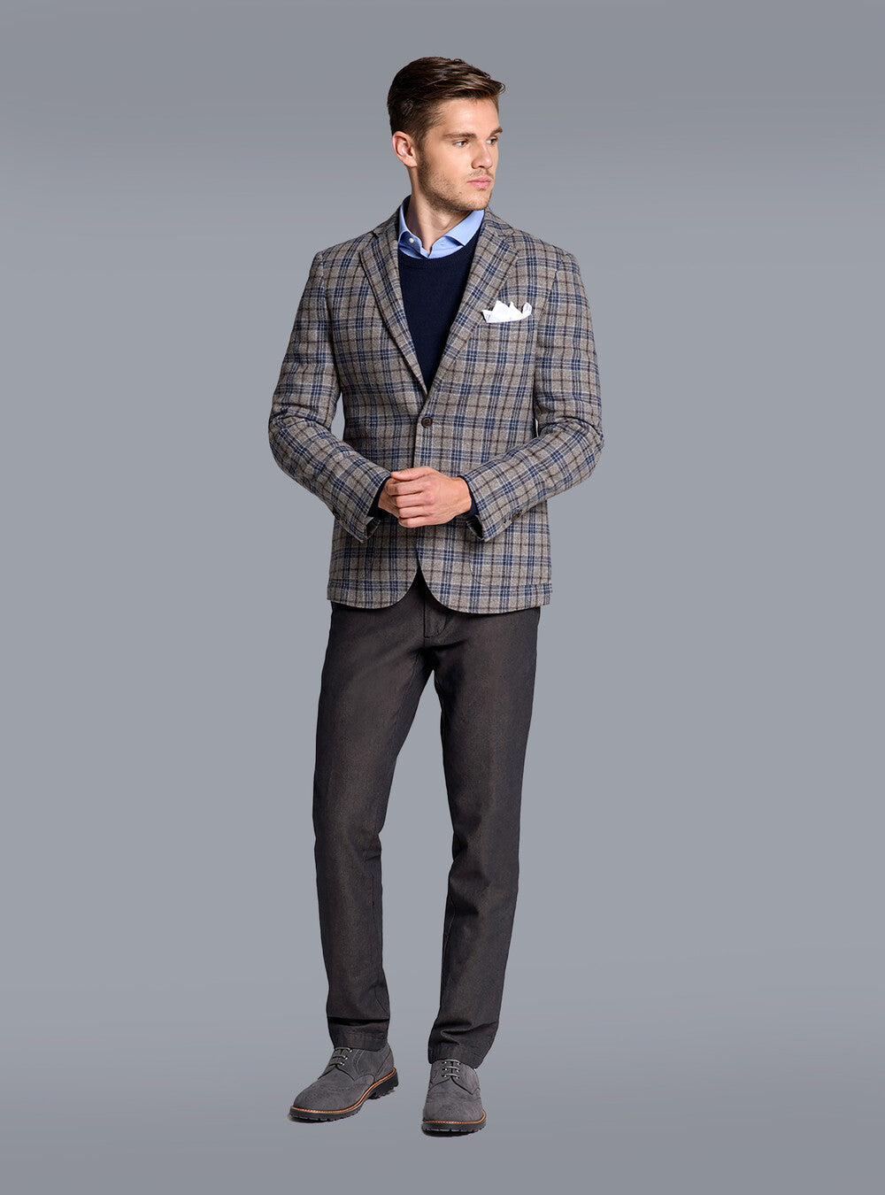Premium men's navy blue cashmere sweater, showcasing its luxurious soft knit & versatile design.