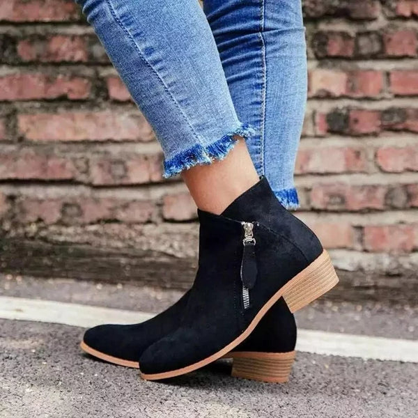 Black women's fashionable zip-up ankle boots, versatile for casual outfits, front view