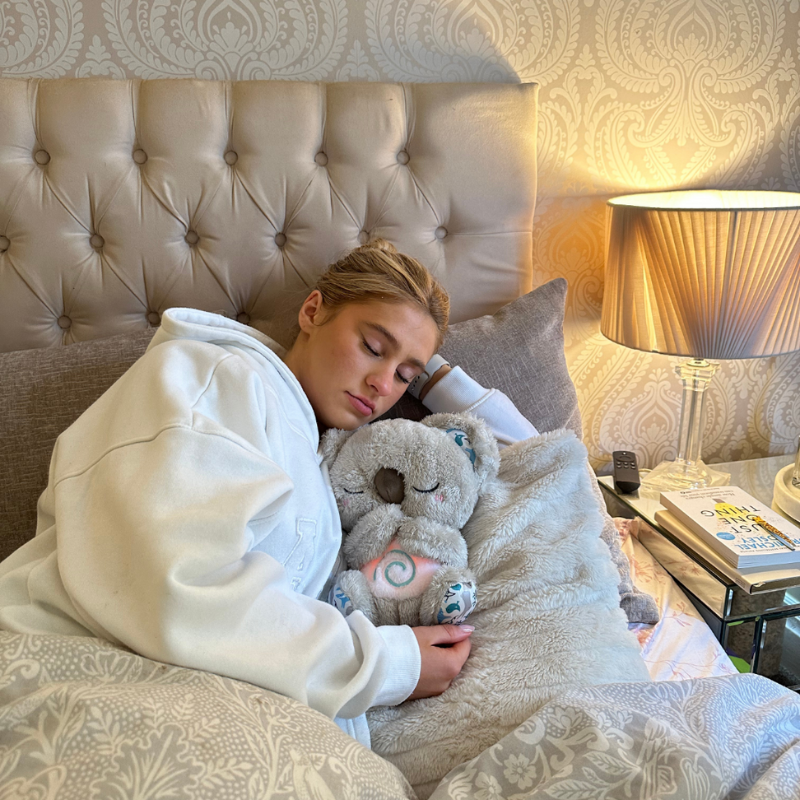 Soft comfort animal sleep aid featuring calming sounds & gentle night light, ideal for nursery relaxation.