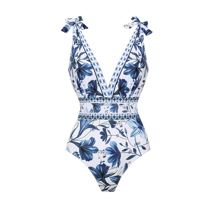 Women's poolside style: an elegant two-piece swimsuit set with a coordinating beach skirt.