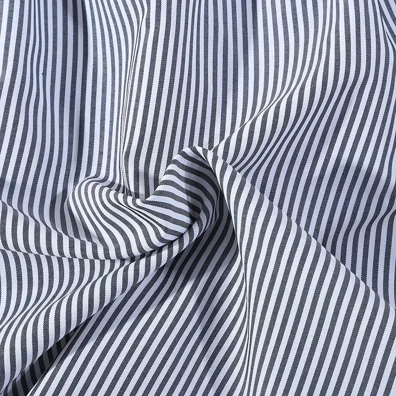 Wardrobe staple white women's shirt extender, elastic waist, round hem, ideal for layering.