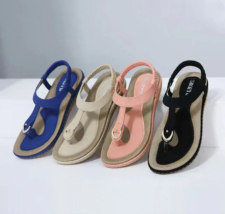 Comfortable women's Elodie flat slip-on sandals, ideal for beach, vacation, or everyday summer.