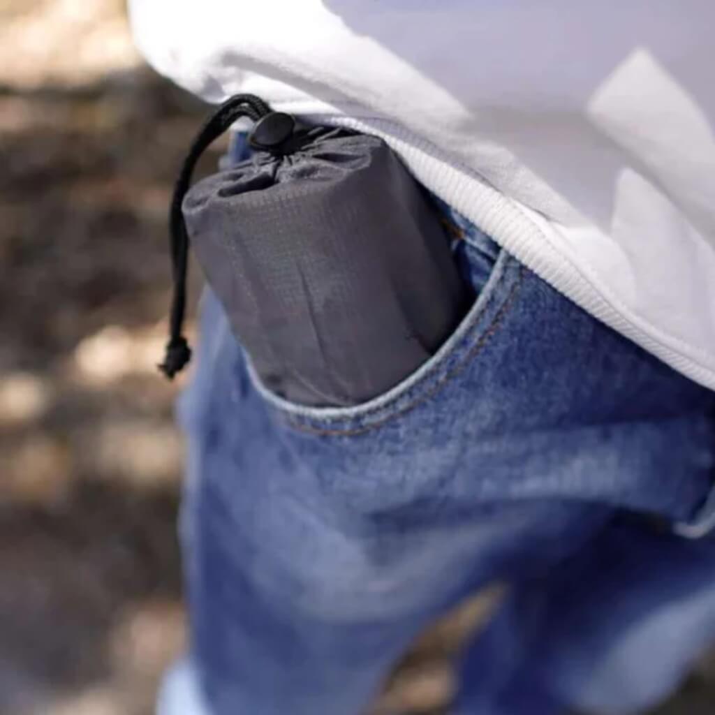 Compact lightweight travel seat cushion, easily inflatable for portable comfort during outdoor activities & travel.