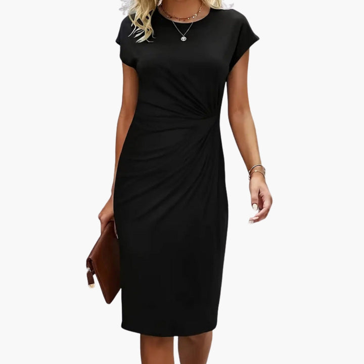 Elegant women's round neck short sleeve midi dress in classic style. Perfect for versatile day-to-night wear.