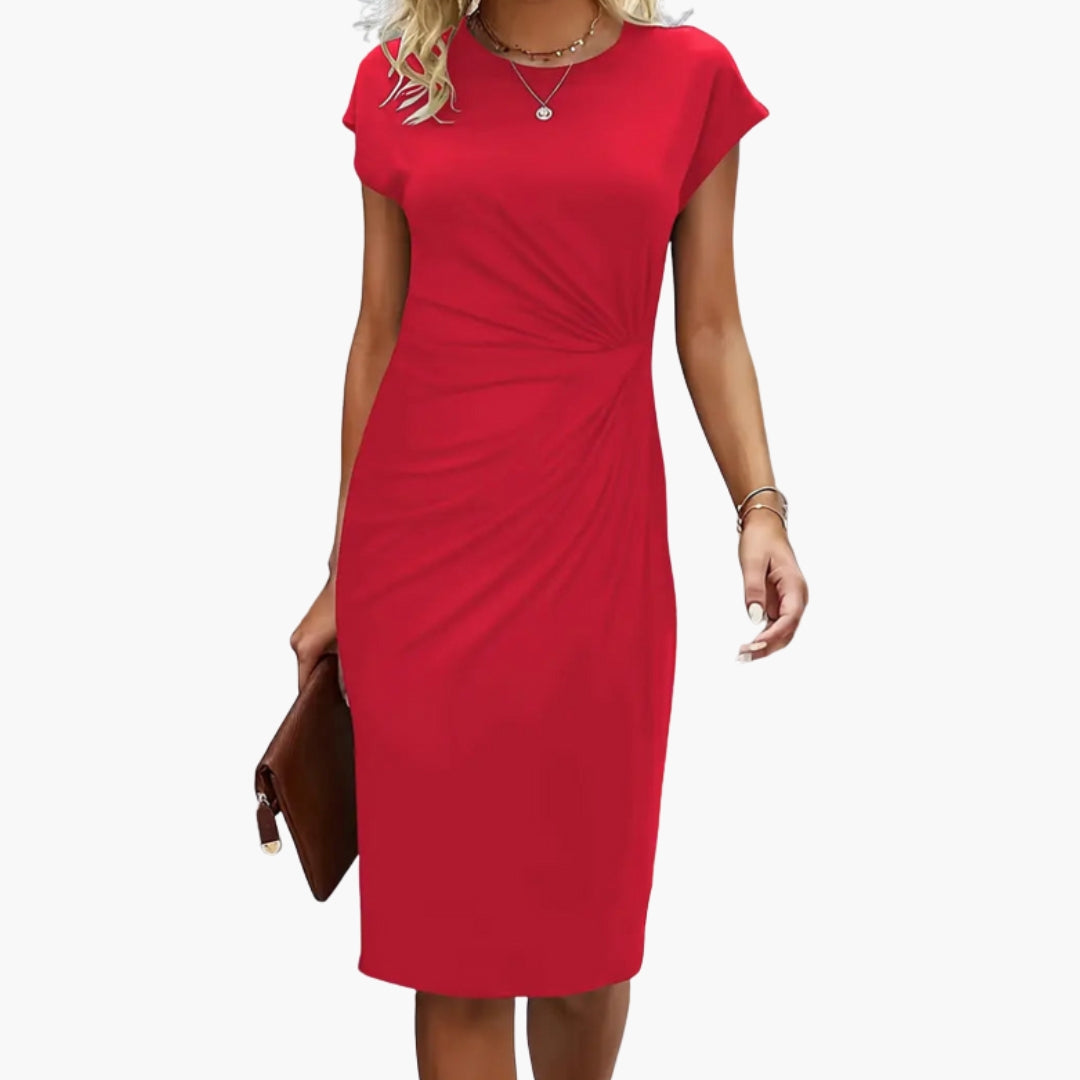 Close-up of elegant women's midi dress featuring a classic round neck and comfortable short sleeves.
