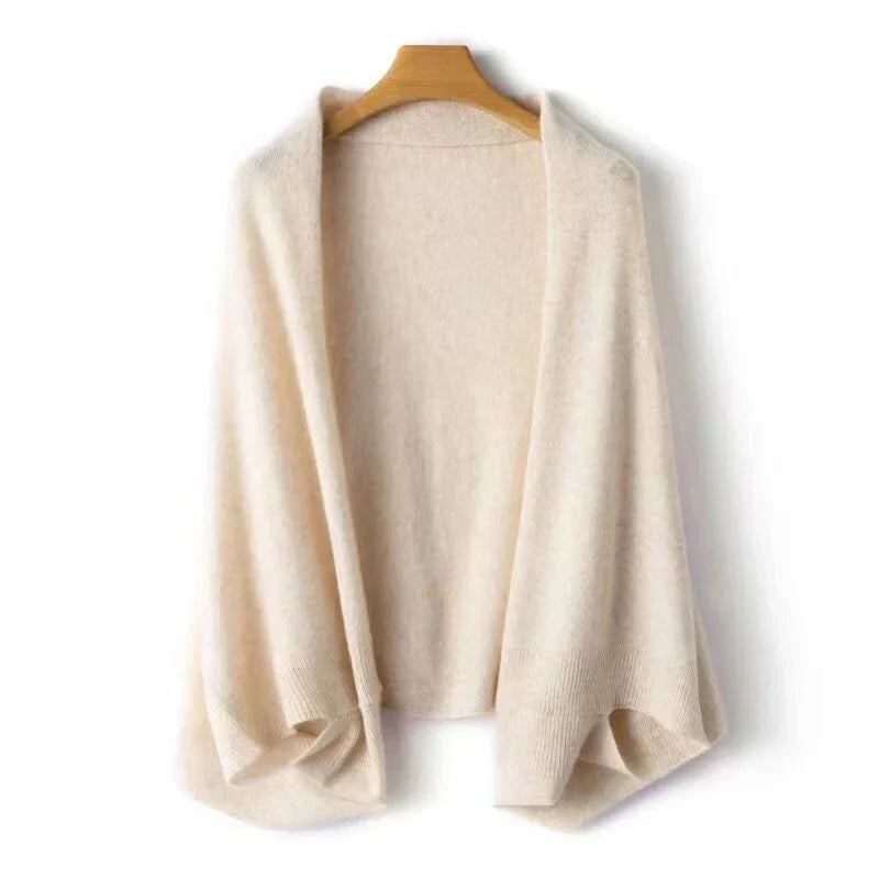 Luxurious pure wool shawl for women, offering soft, warm comfort. Ideal winter accessory with elegant drape.
