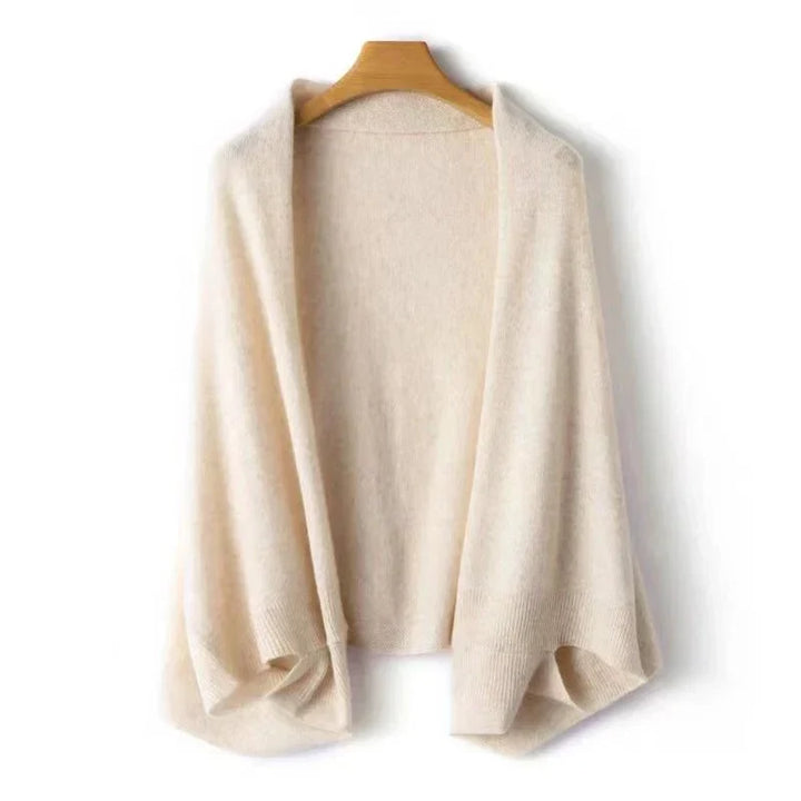 Luxurious pure wool shawl for women, offering soft, warm comfort. Ideal winter accessory with elegant drape.