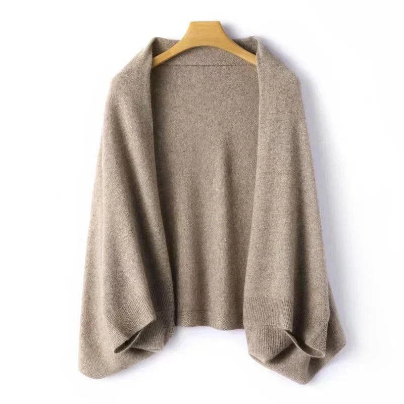 Soft women's pure wool wrap, perfect for cozy fashion and luxurious warmth. Elegant winter accessory.