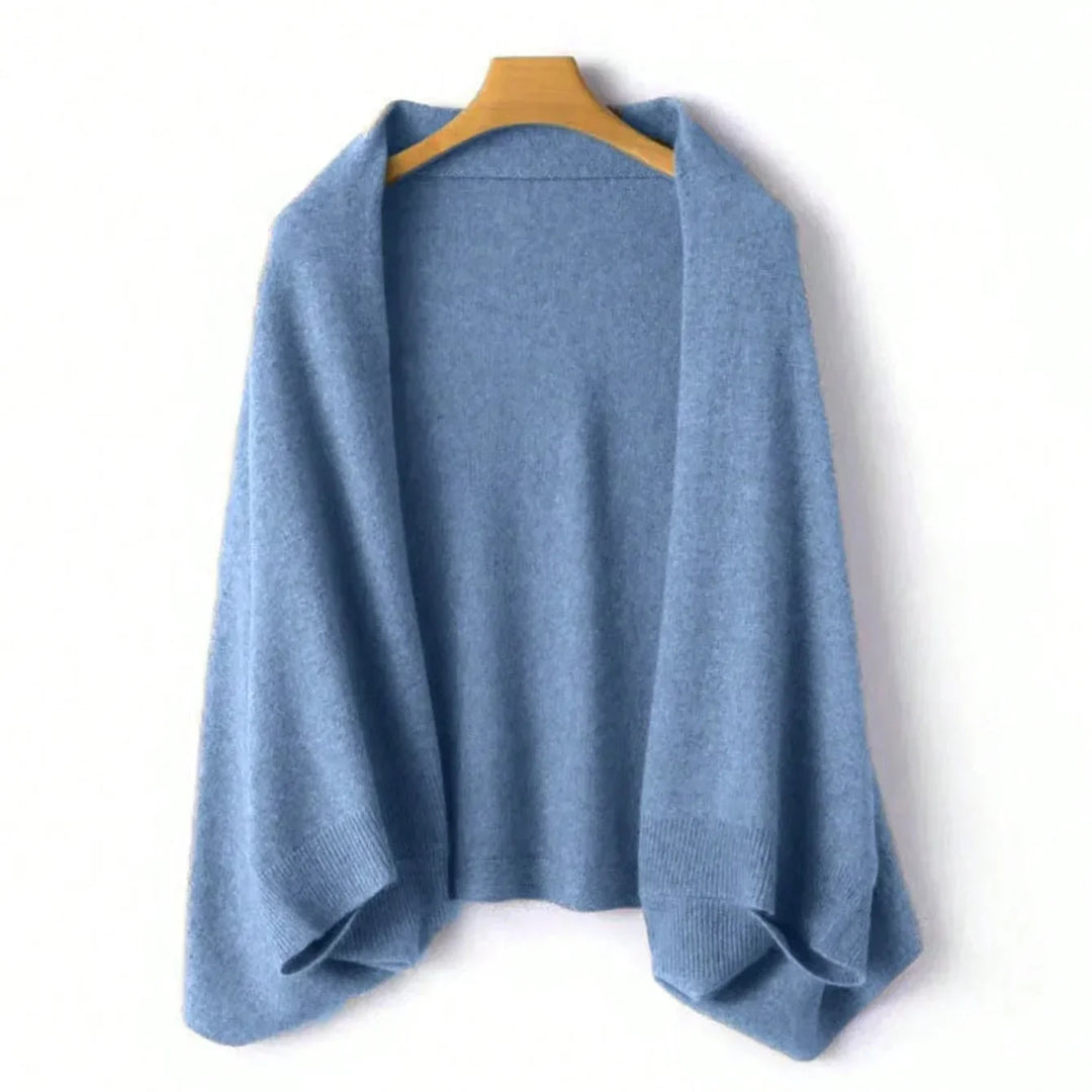 Elegant pure wool women's shawl with a lightweight, soft feel. Perfect as a warm travel wrap or winter accessory.