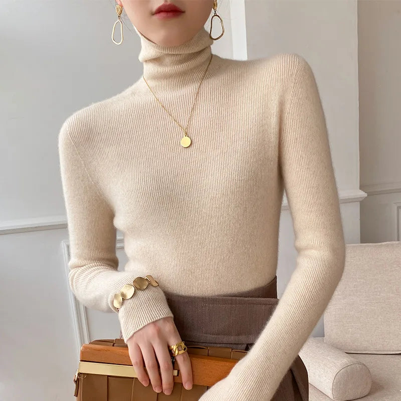 Luxurious women's cashmere turtleneck sweater, soft knit for elegant winter warmth and comfort.