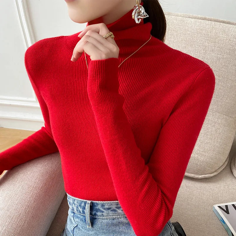 Supple, soft women's cashmere turtleneck sweater, a luxurious knit for elegant winter comfort.