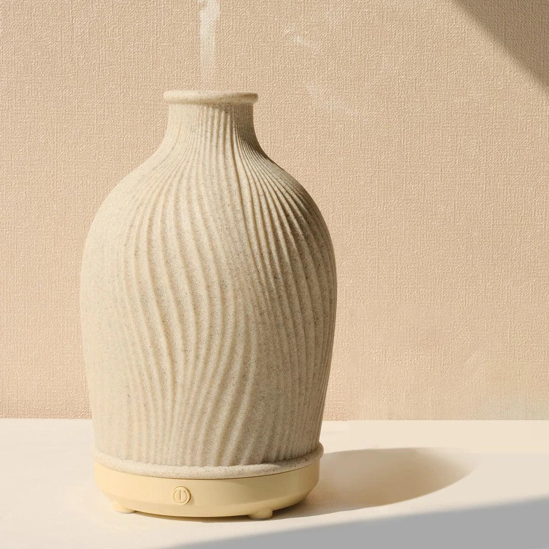 Gentle mist from Tavvitaimp18 ultrasonic humidifier & essential oil diffuser, promoting relaxation.