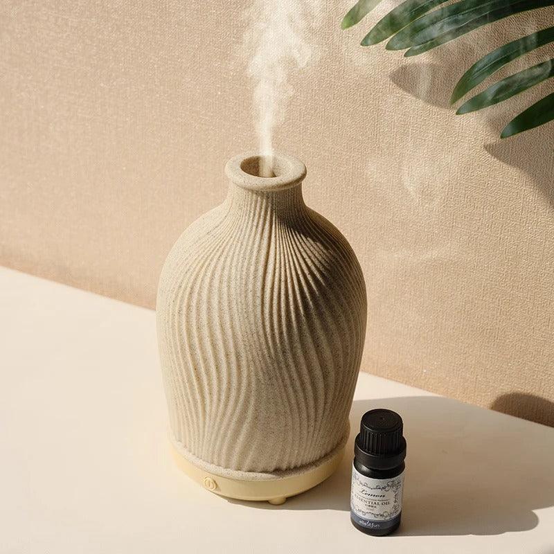 White elegant aromatherapy diffuser & humidifier, a chic home decor addition, improves air quality.