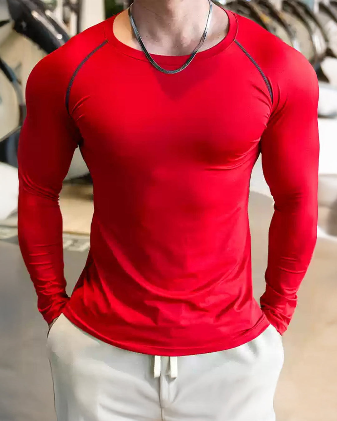 Stylish men's athletic long sleeve, black shoulder cut design, suitable for all sports