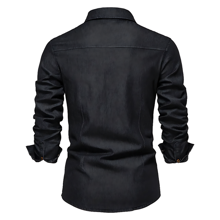 Man wearing black AdaptiveFit slim fit long sleeve shirt casually, showcasing modern men's fashion.