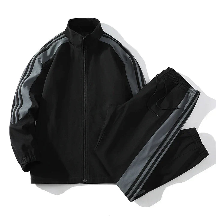 Men's black athletic jogger set with zipper jacket, ideal for sportswear and casual wear