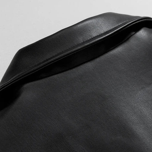 Urban edge men's black oversized bomber jacket, retro-inspired for comfortable mid-season streetwear.