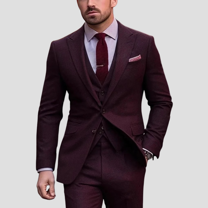 Stylish men's slim fit three-piece suit, an ideal black wedding suit for grooms & guests.