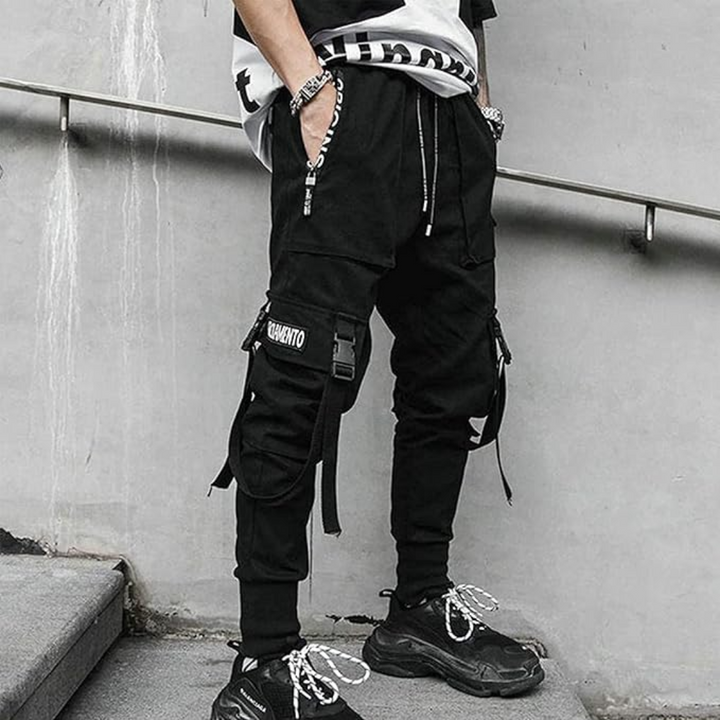Contemporary men's techwear tactical trousers, combining urban style, utility, and comfort.