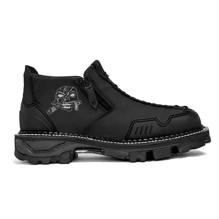 Black men's skull ankle boots with lace-up front and side zipper, perfect for a punk rock or gothic fashion look.
