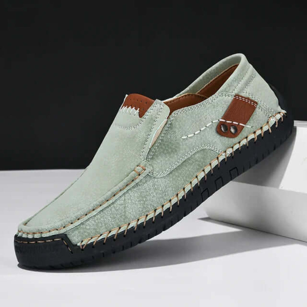 Comfortable men's green slip-on walking shoes with advanced arch support, perfect for casual wear and daily comfort.
