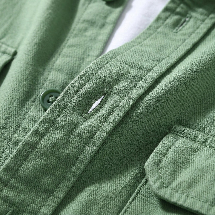 Stylish men's overshirt. Versatile button-up casual shirt for layering. Essential men's fashion outerwear.