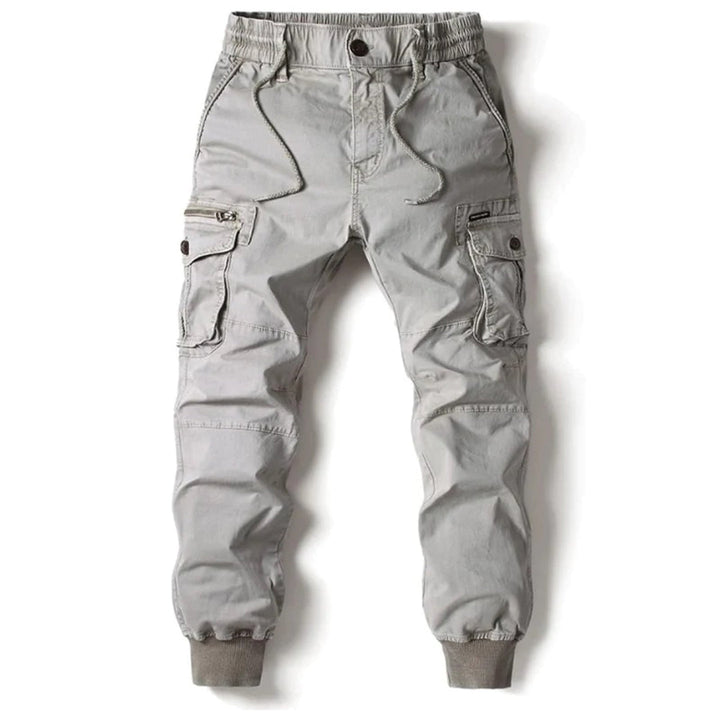 Men's cargo jogger pants with functional pockets, combining utility with streetwear style.