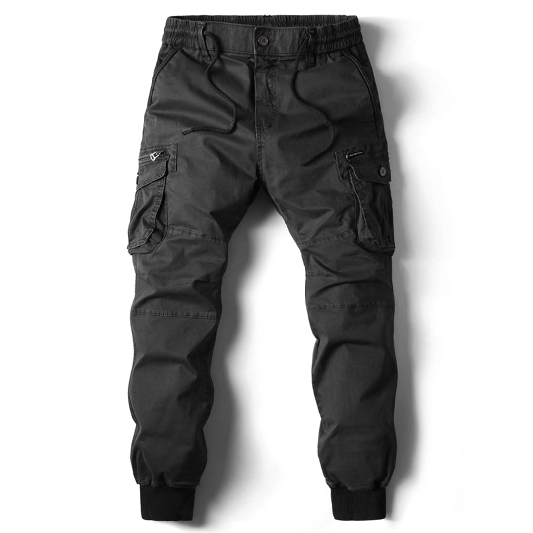 Overhead shot of men's casual elastic waist jogger pants, neatly folded.