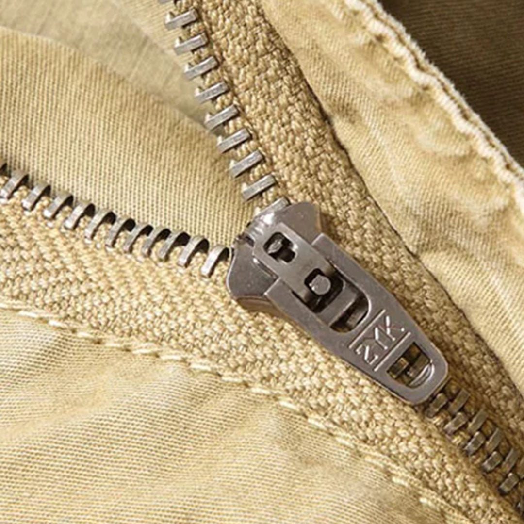 Male model wearing men's casual khaki jogger pants, showcasing the relaxed fit.