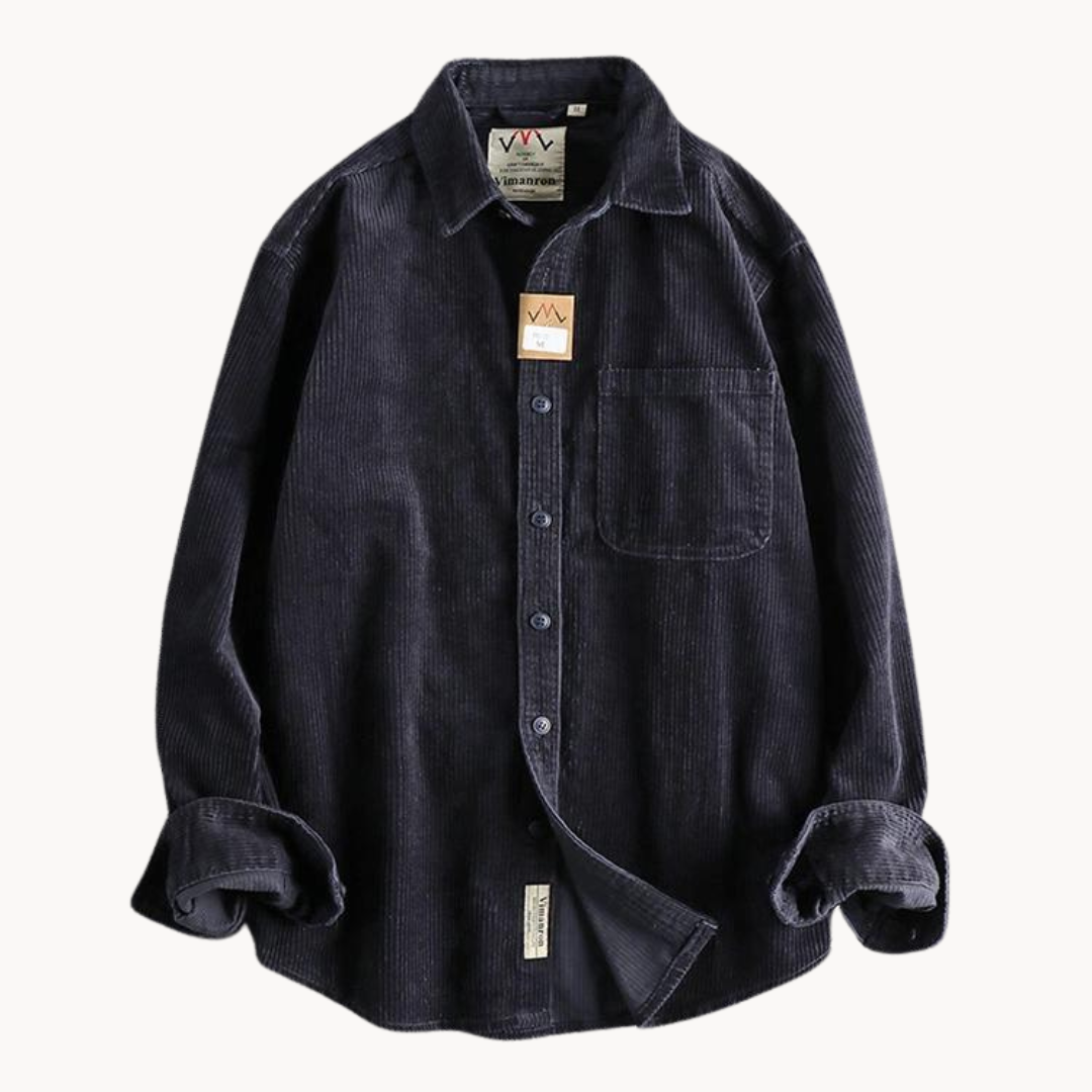 Detailed shot of the buttons and collar on a men's corduroy long sleeve shirt, suitable for casual outings.