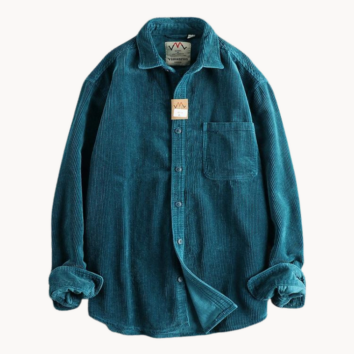 Model showcasing the fit and style of a men's casual corduroy long sleeve button-down shirt.