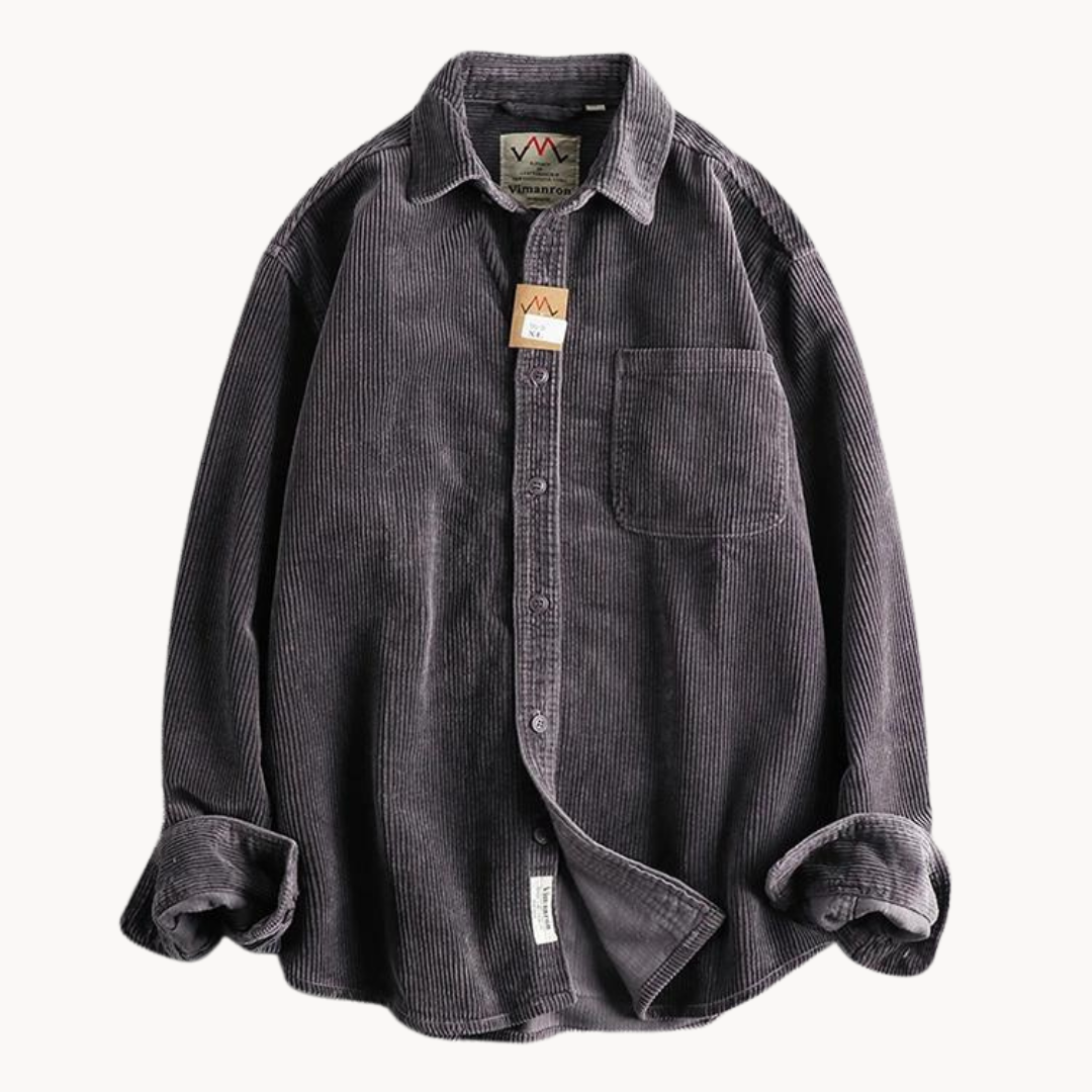 Stack of folded men's corduroy long sleeve button-down shirts in various colors, great for autumn/winter.