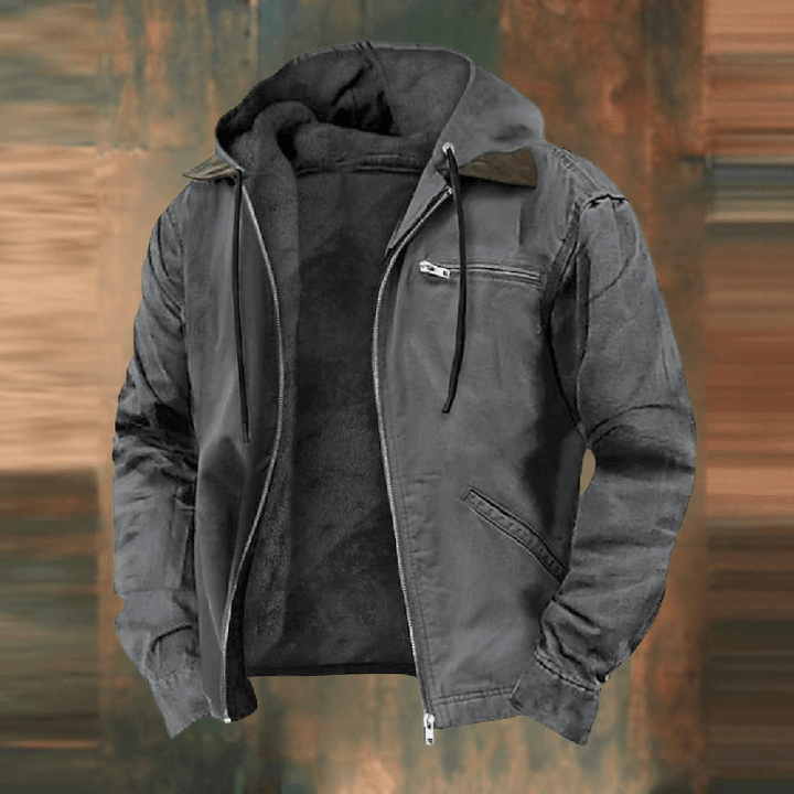 Man wearing a comfortable men's casual zip-up fleece hooded jacket, side view, outdoor setting