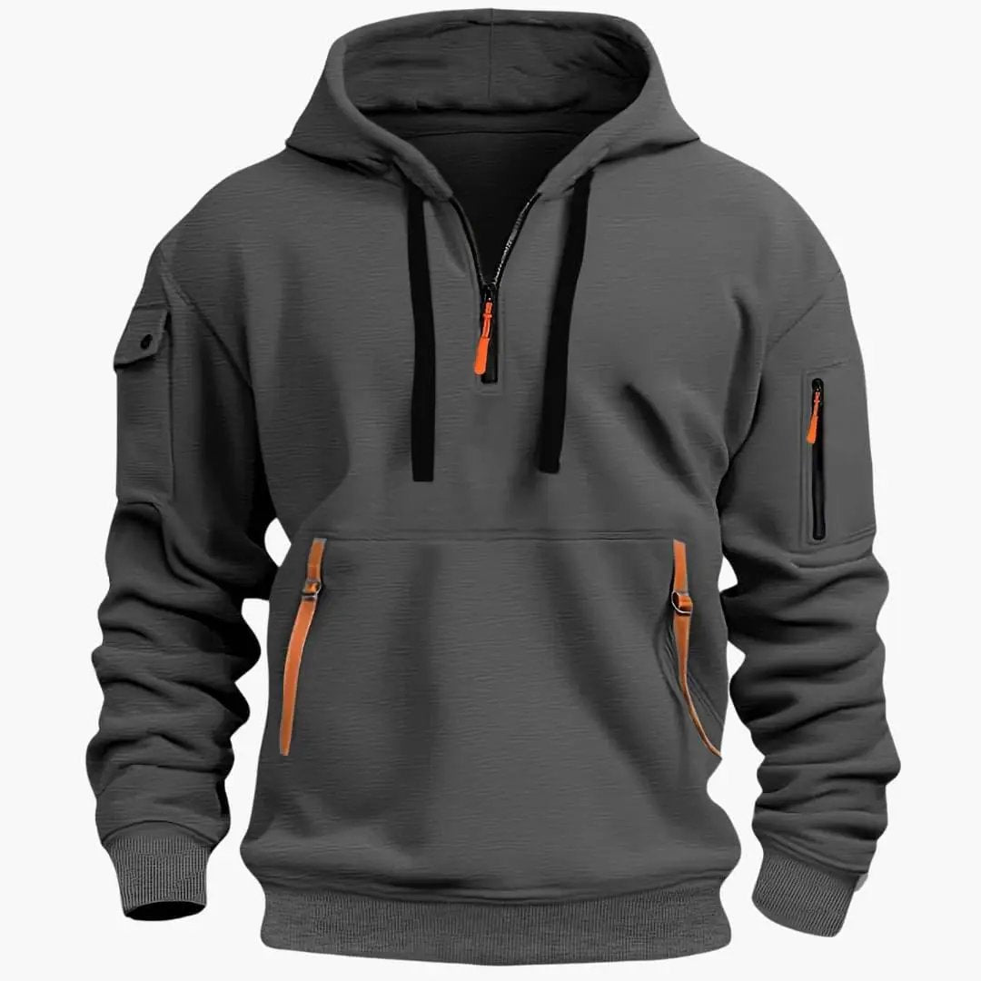 Relaxed fit men's half-zip hoodie, comfortable pullover for activewear or casual style, with secure pockets.