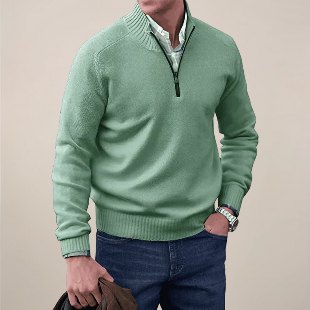 Spring apparel: men's long sleeve half-zip knit sweater in a comfortable, breathable fabric.